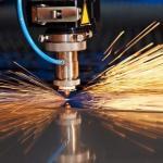 Laser cutting of metal sheet with sparks
