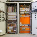 Electricity distribution box with wires, circuit breakers and fu